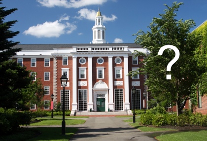 Photo of a university building with a question mark