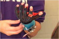 Sensor gloves to provide feedback to children learning Auslan sign language from a computer